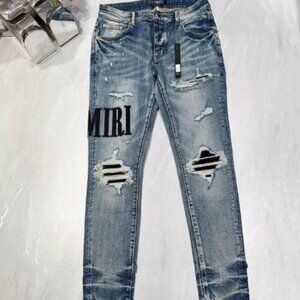 AMIRI Blue Distressed Boyfriend Jeans